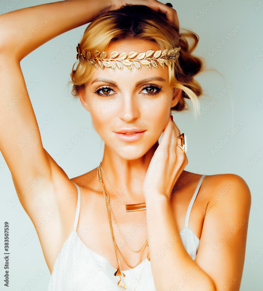 Canvas Prints young blond woman dressed like ancient greek godess, gold jewelry close up isolated, summer trends