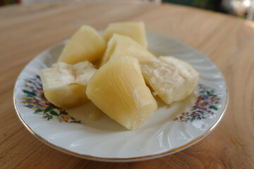 Steamed cassava served on a plate