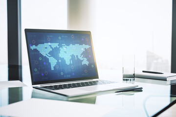 Abstract creative world map on modern laptop screen, international trading concept. 3D Rendering