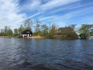 Fototapeta premium landscape with river and sky in the village of Giethoorn, Holland Netherlands