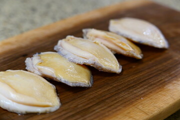 prepared raw abalone closeup