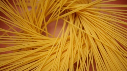 Throwing spaghetti pasta into a pan in slow motion - Powered by Adobe