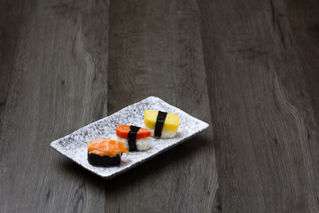 fresh raw pork, meat ,beef, belly, sliced on square plate  on wood, wooden background,set shabu, hot pot ingredients.