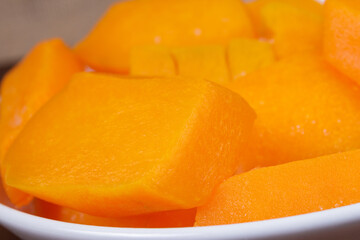Pieces of pumpkin close-up. Macro shot.