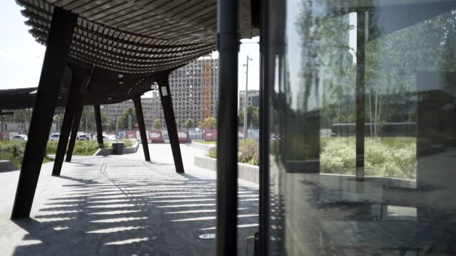 Park Tuffel Grove or Tyufeleva roshcha, view under unusual construction. Action. New residential area on a sunny summer day, concept of architecture.