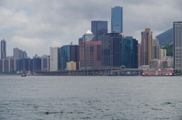 Residential area in old apartment with windows. High-rise building, skyscraper with windows of...