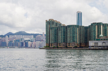 Residential area in old apartment with windows. High-rise building, skyscraper with windows of...