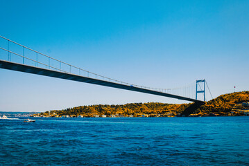 A view of Fatih Sultan Mehmet bridge and the Bosporus from an embankment in the Arnavutköy district of Istanbul. Turkish San Francisco.