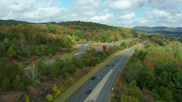 flying alongside interstate 91 in the early autumn