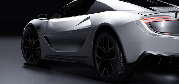 Fototapeta Rear view of modern fast sports car in studio light. Brandless generic contemporary design