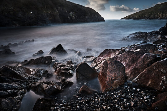 Port Qiun Long Exposure Over Rocks