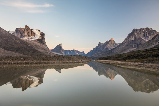Reflection of mountains in Summit Lake, Akshayak Pass