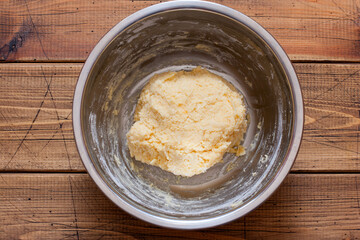 Cooking oven-baked cheese balls step by step, step 3 - kneading cheese dough, horizontally