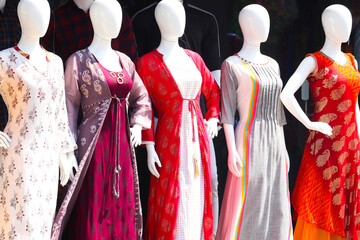 Obraz premium Mannequin Of Female Girls Wearing Colorful Indian Traditional Cultural Fashion Trendy Ethnic Dress Salwar Suit