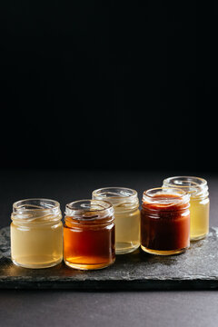 berry tinctures in shorts on black background