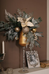 christmas tree closeup with gold and silver ornament
