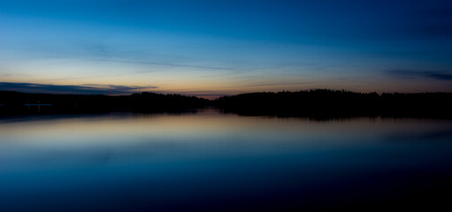 Fototapeta premium Sunset on Lake Ladoga in the spring.