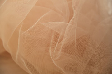 folds of translucent tulle fabric close up