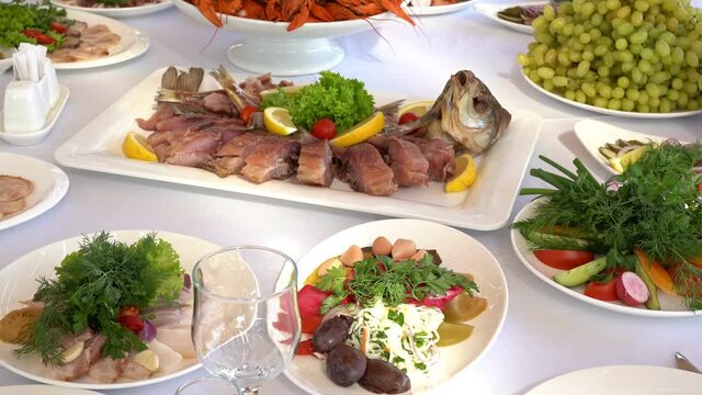 bream and crayfish on holiday table. beer snack. river food for party.