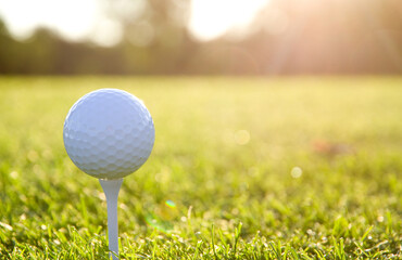 White Golf Ball on a White Tee Shot Against the Sun