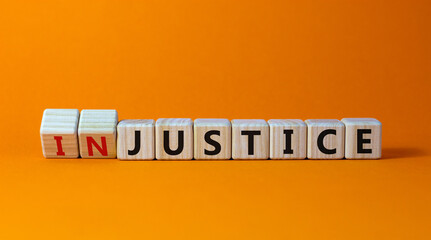 Justice instead of injustice. Turned cubes and changed the word 'injustice' to 'justice' on wooden...