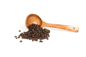 Coffee beans are strewed in a spoon wood for coffee on a white background