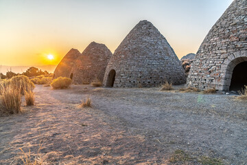 A row of historic beehive shape charcoal ovens constructed during the 19 century as part of silver...