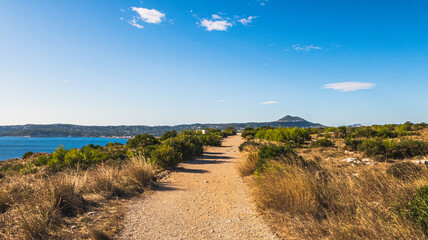 Fototapeta na wymiar Beautiful path surrounding the coastline, in Jávea, Alicante (Spain)