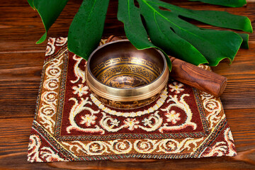 Tibetan singing bowl. Tibetian inscription - mantra 