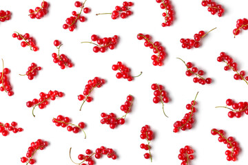 Pattern of fresh red currants isolated on white background