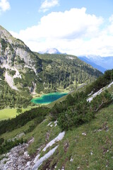 Fototapeta na wymiar Turquoise shining Seebensee in the Austrian Alps close to Ehrwald in Tyrol 