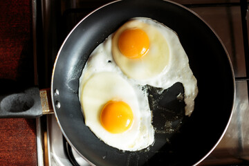 making english breakfast. cooking scrambled eggs.