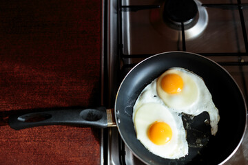 making english breakfast. cooking scrambled eggs.