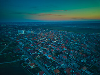 Aerial view of a small town in sunset.