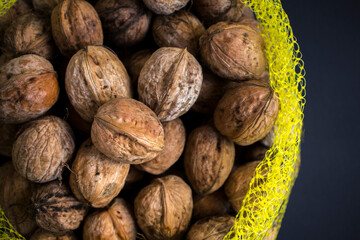 Walnuts in close-up. Black background