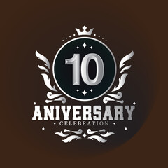 10 year anniversary logo with elegance silver color isolated on brown background for celebration event
