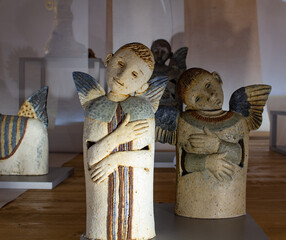 Figures of angels. Handcrafted. Ceramic and wood figurines