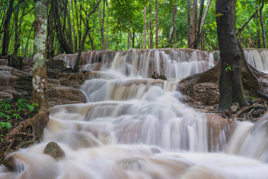 Waterfall scene at Pha Tad Waterfalls in rainforest  at the Khuean Srinagarindra National Park Kanchanaburi.