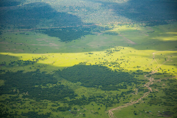 A aerial shot of the Kenya savannah, 91 miles east of Nairobi, Kenya, africa. - obrazy, fototapety, plakaty