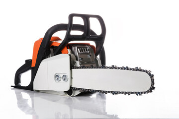 Professional petrol chainsaw isolated on a white background.