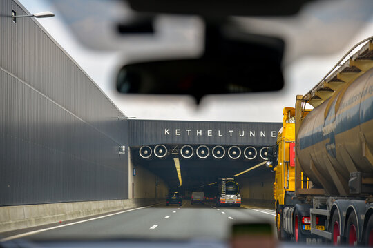 DELFT, NETHERLANDS - APRIL 15, 2019: Cars enter at the Kethel tunnel. The a4 highway.