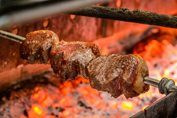 Picanha barbecue roasted over hot coals. This form of barbecue is widely consumed throughout Brazil.