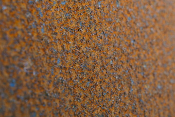 Rusty iron surface. Red background or wallpaper. Industrial production and scrap metal. America's rusty belt. Corroded backdrop. Close-up