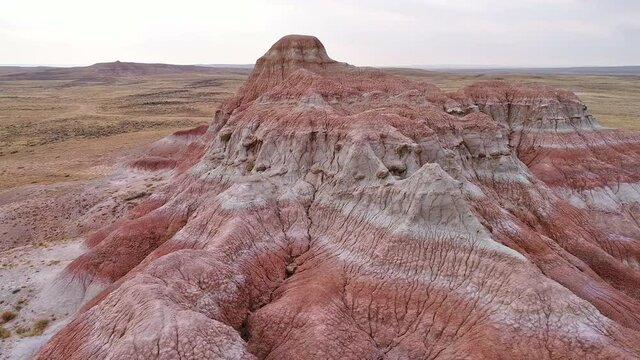 Rotating around the Red Hills in the Wyoming desert viewing the colored strips in the textured landscape.