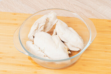 Fototapeta na wymiar boiled chicken breast on the table closeup