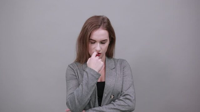 Attractive scowling angry, Head shot scowl, was offended gloomy eyebrows, Sulky, Waist-up portrait of beautiful face in displeasure, affront tensed, having bad mood, getting mad, frowning forehead