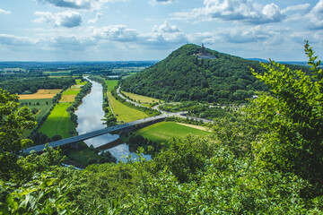 Emperor William Monument on top of Wittekindsberg and the Weser river on the left. Near the city of...