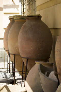 large ancient pithos clay vessels for storing wine, cereals and other products. vertical photo. south of Russia
