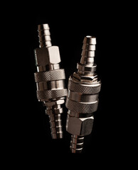 Modern with levitating metal pneumatic fittings, auto parts for concept design on black isolated...