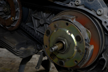 Naklejka premium Damaged motorcycle engine spare parts close-up